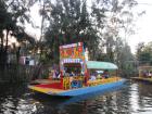 Riding a trajinera (boat) through Xochimilco is a colorful way to experience local culture