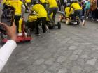 During the general race of the wooden cars, teams raced down the streets, all dressed in Ecuador jerseys