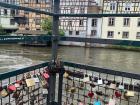 Rebecca: On this bridge overlooking the river, couples have written their names on heart shaped locks