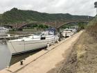 Tom: Private pleasure boats share the waterways with commercial and cruise vessels. The boat on left is from Norway and the right is from Germany