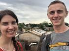 Usumon and Anseta (Matthew and Naomi) take a selfie from the top of a friend's house in the little town.