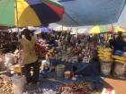 People come from The Gambia to sell their wares. Many people from The Gambia speak English due to the long history of the colonization by the British, and they still use English in schools and professional settings.