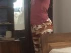 Ansetta uses the only mirror in the house to check on her appearance before heading out. The girls fight over the mirror space often when getting ready to go. 