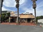 A famous bookstore in South Africa with a car on the roof