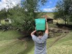 There is no running water in people’s houses here, so I have to go to a nearby water pump and carry my water back on my head! 