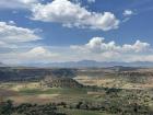 The view of the highlands mountains in the distance, taken from the flatter lowlands