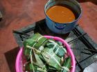 Here is a basket of tamales, ready to cook, right next to the recado sauce that they are filled with