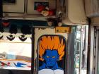 "Camionetas," or chicken buses, are often decorated with cartoon or anime characters