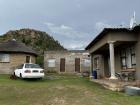 This is our family compound! Matsepe's dad lives in the far left house, my house is the middle one, and the big main house is on the right