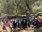 Gathering to hear the school choirs sing