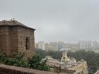 The city of Malaga is just about visible from the Alcazaba on a foggy morning