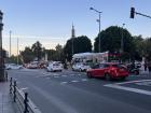 What a street looks like in Seville, full of cars and public transportation options
