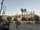 The Cathedral of Seville at sunset with a glimpse of the Christmas lights that fill all the streets of the city at this time of year