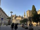 A side of the Cathedral that features the Giralda tower and part of the Acazar