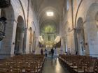 Inside of the Cathedral, with pews and a large staircase