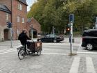 Pedestrian crosswalk with a specific lane for bikes to use while crossing the road, too!