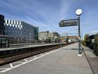 Train platform displaying the next arriving train