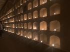 Candles to decorate the small graves in a cemetery