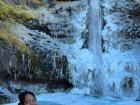 A frozen waterfall on the Ring Road in Iceland