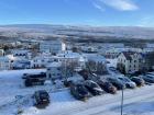 Snowy mountains and streets in Akureyri, Iceland