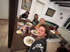 Fellow S.I.T. students and I at our apartment eating a meal we cooked together in Akureyri, Iceland.