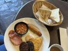 A traditional Irish breakfast consists of sausage, eggs, beans, toast, bacon and black & white pudding!