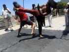 In Capoeira both the arms and legs are used during combat.