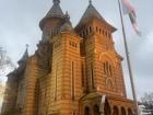 This cathedral is an Orthodox church called St. George's Cathedral. It is located in the city center of Timișoara