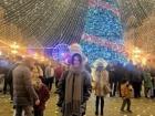 In front of a Christmas market in Timișoara, Romania! This small Romanian town is close to the border with Serbia, and only takes 2.5 hours by car from Belgrade