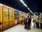 A special Christmas train that people can ride during the holidays, decorated all over the outside and inside