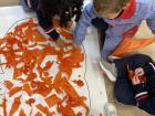 My kids took tissue paper to fill in a big pumpkin drawing