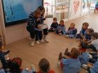 Learning about the "a" sound by looking in the box and finding toy ants