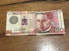 50-sol bill and 50 centimos, Peruvian currency