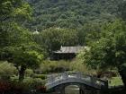 The National Palace Museum has a beautiful garden that guests can wander around and enjoy the natural beauty of the surrounding hills