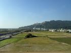 Riding on trains is one of my favorite ways to see Taiwan. I get to see so many different places including this view where I could see the ocean. mountains, and agriculture fields all at once!