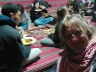 After taking off our shoes, we enter the Bedouin tent then and eat on the floor 