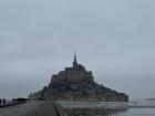 A picture of Le Mont-Saint-Michel and the surrounding sanding bay