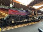 The inners of a steam train on display at the Cité du Train