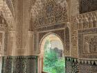 These are the intricate carvings and mosaics inside the Alhambra.