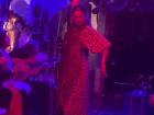 This talented bailaora, or dancer, is performing at a flamenco show in a cave.