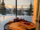 Waffles with brunost, white cheese, jam and a great view.