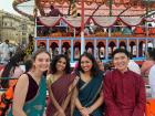 Celebrating Dev Diwali with my friends--with two other girls and me wearing saris!