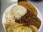 A typical “corrientazo,” which roughly translates to “electric” or “fast” lunch (meat, rice, beans, plantain and side salad)