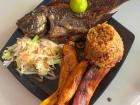 "Mojarra" with "arroz de coco" (coconut rice), salad and plantains