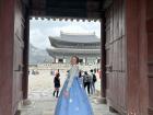Wearing 한복 (han-bok) at 경복궁 (Gyeong-bok-gung), a palace that once housed Korean kings and queens