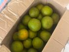 Western African Oranges are orange on the inside and green on the outside. You can buy them on the side of the road and the vendor will peel them for you!