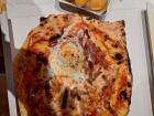 This pizza was really surprising to me: it's made with egg!