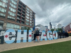 My younger sister Laura and I picking up our race bibs for the Chicago half marathon in 2024