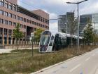 Trams are like trains, but they ride on rails embedded directly in the street