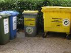 Household waste is separated into several bins, then much of it is then recycled or incinerated to make energy